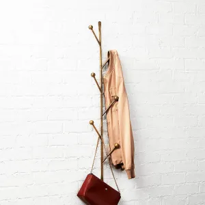 NEW Barker Sculptural Vertical Wall Mounted Coat Rack, crafted from Iron with a warm gold finish, also ideal in the bedroom for necklaces, scarves, and your favorite cozy robe.